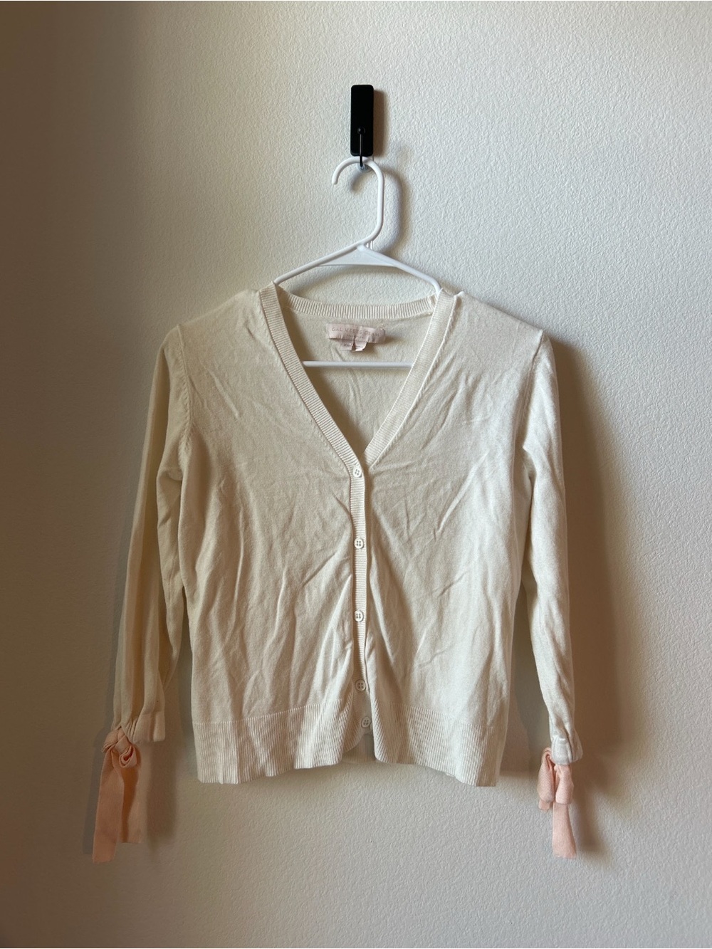 Gal Meets Glam Cream V-Neck Button Cardigan with Bow Cuffs